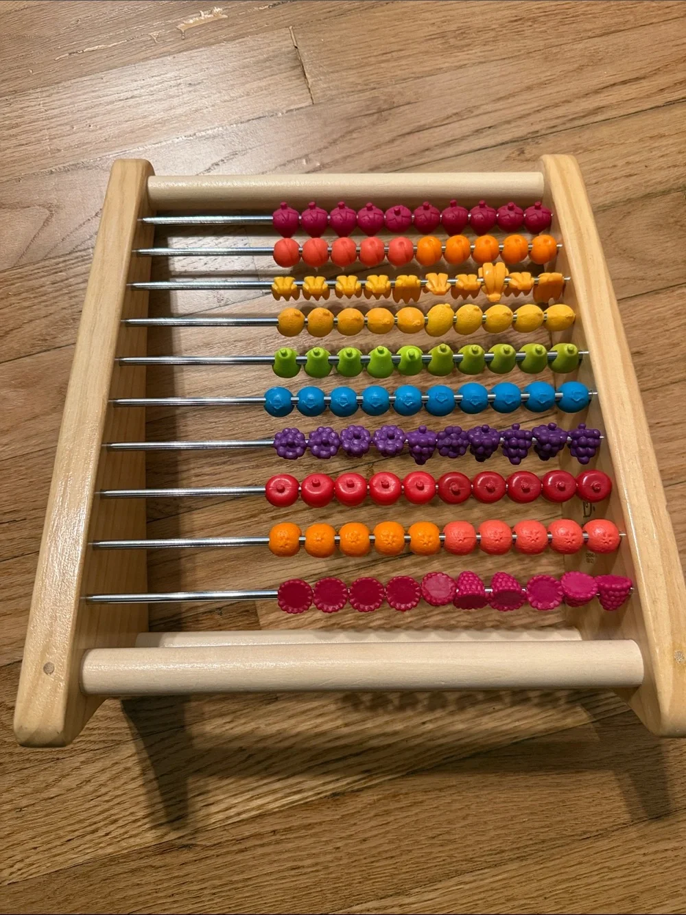 B. Toys Wooden fruit Counting Abacus - Multicolor like new